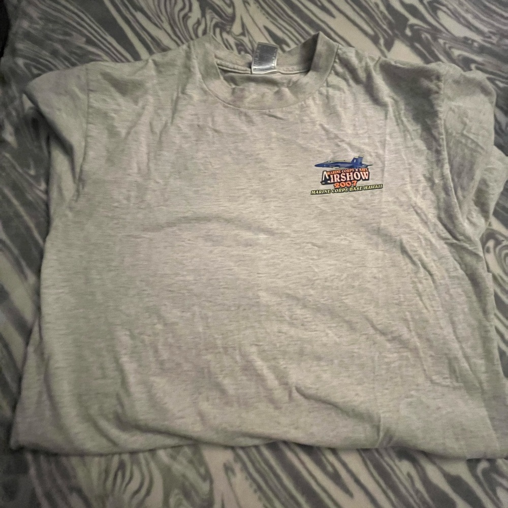 crema color shirt , really nice colors in the back and great for style